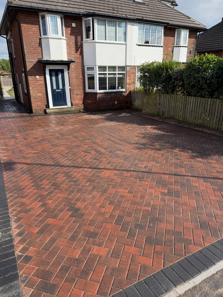 After: new brindle herringbone block paving and charcoal borders at the same Horsforth property
