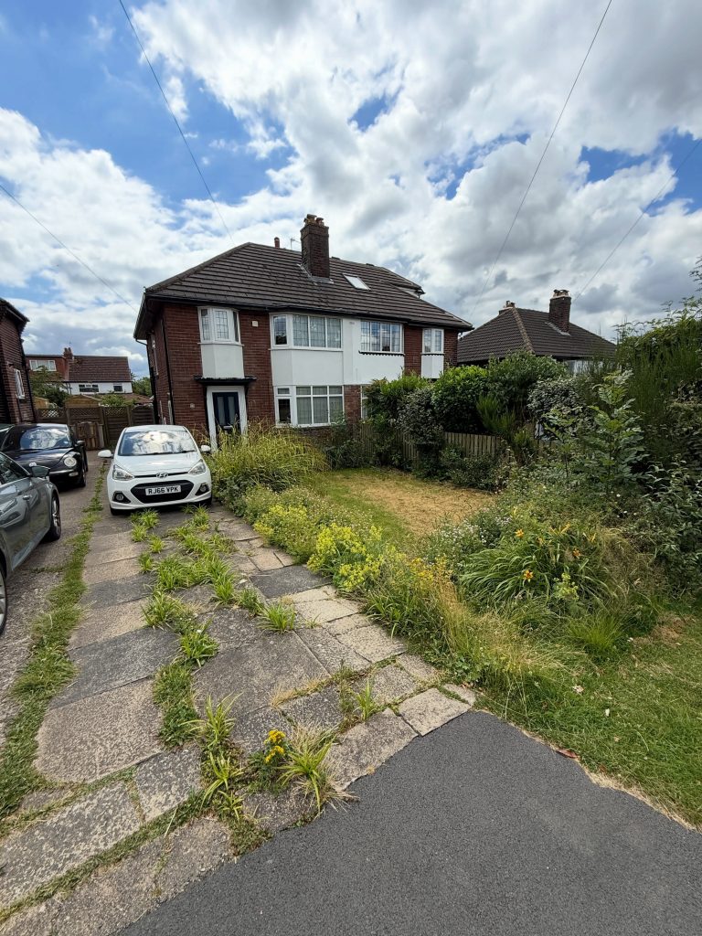 Before: mixed paving and an overgrown front garden at the Horsforth property
