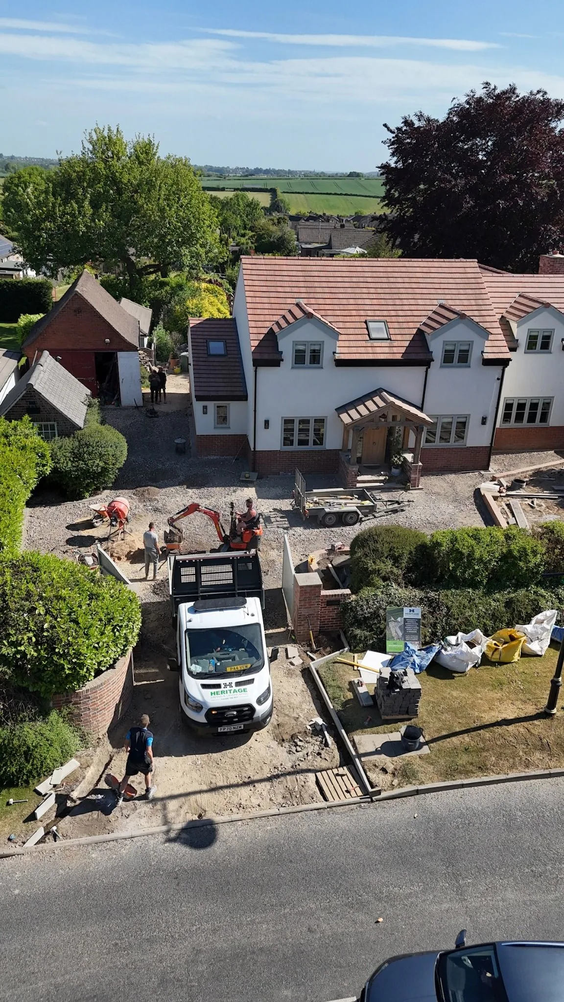 Heritage preparing the ground for a block paving driveway