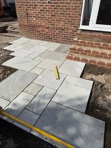 Natural-stone patio being laid in Adel