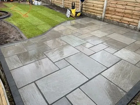 Close view of Indian sandstone paving installed in Farsley