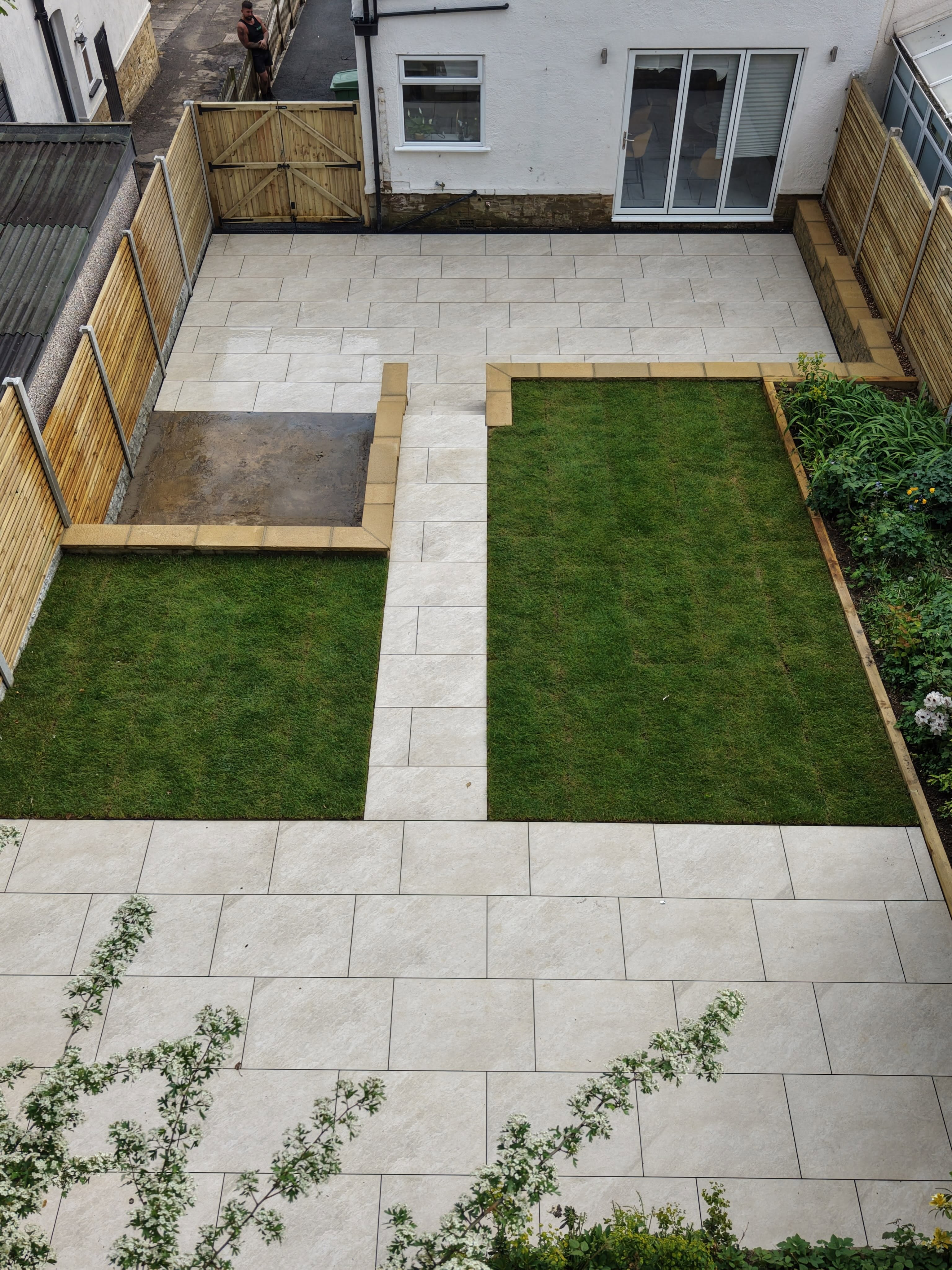 Porcelain terraces and central steps viewed towards the house — Leeds