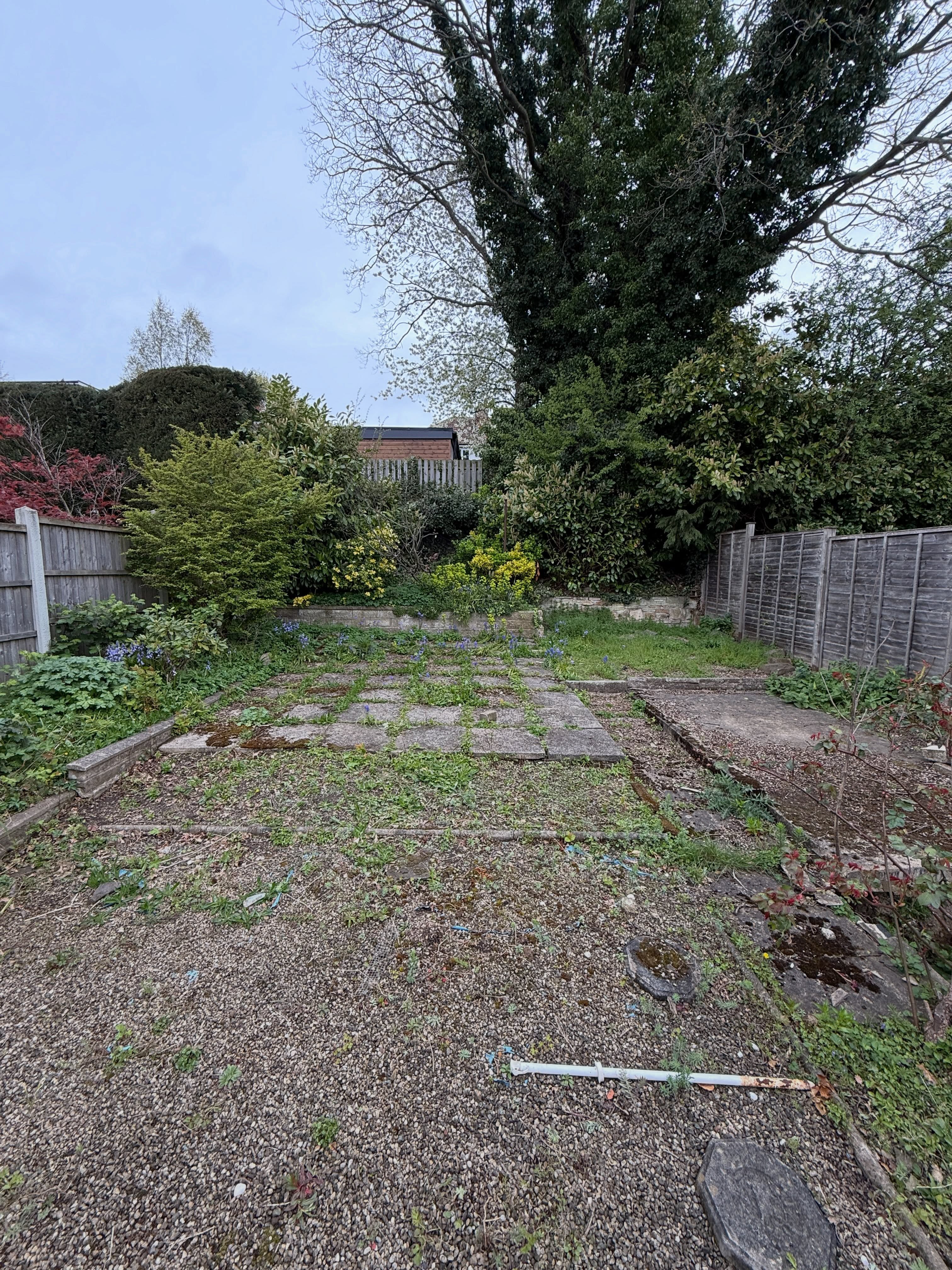 Original garden paving before refurbishment — Leeds