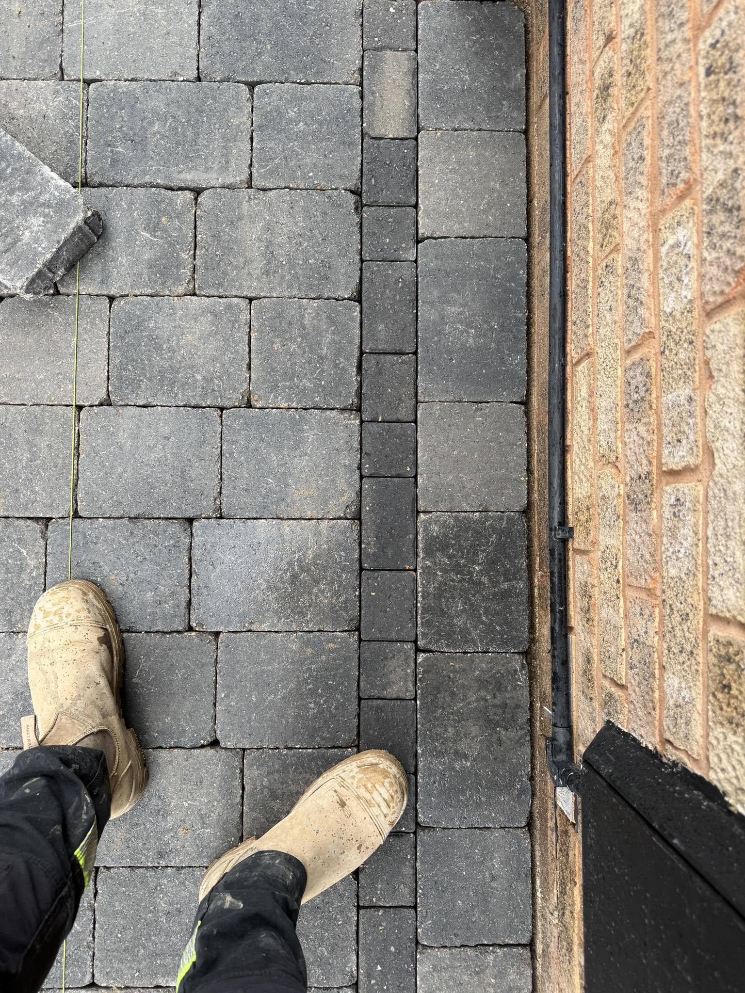 Sorrento Tumbled 60mm block paving in Granite Stone during installation
