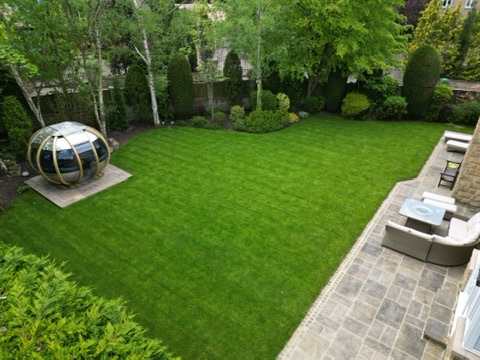 Finished lawn, relaid patio and garden pod base viewed from above — Wigton Lane, Leeds