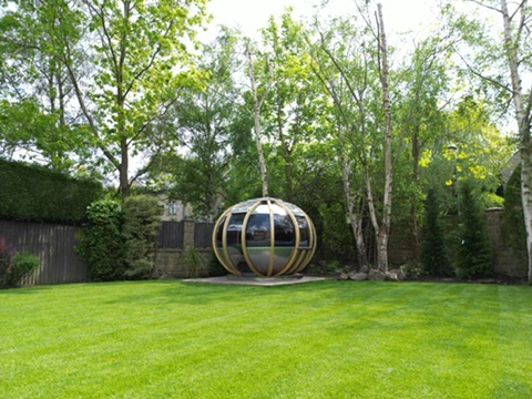 Garden pod on its prepared base beside the completed lawn — Wigton Lane, Leeds